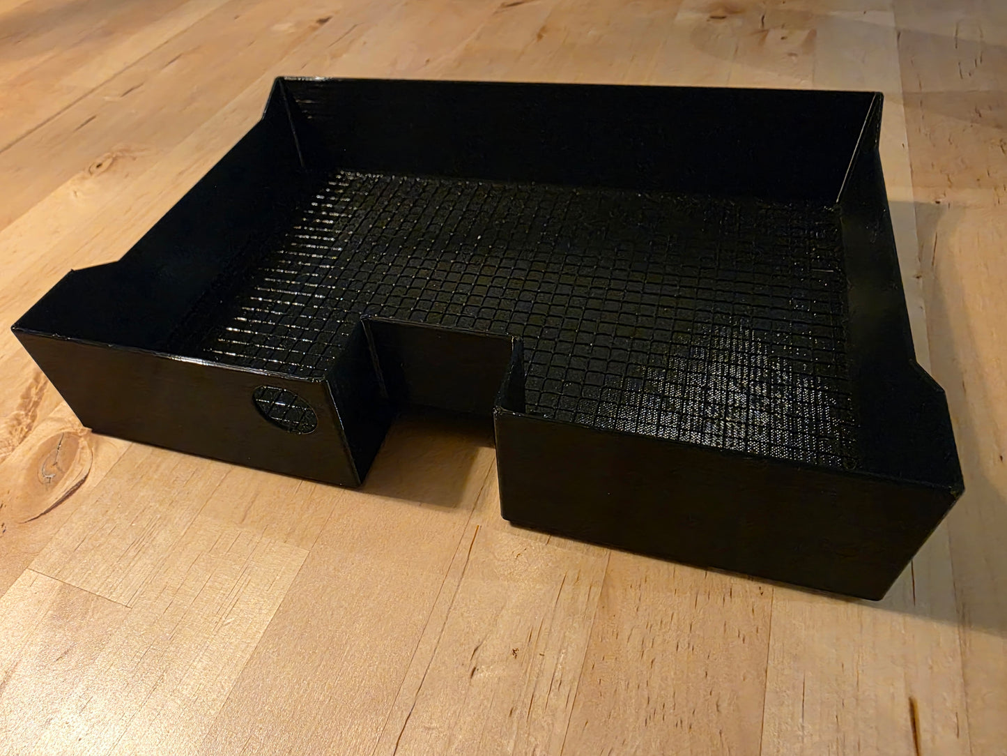 Under seat glovebox tray with flat bottom.
