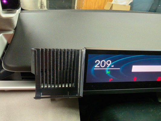 Fisker Ocean Phone Holder mounted on the LEFT side of driver's display.